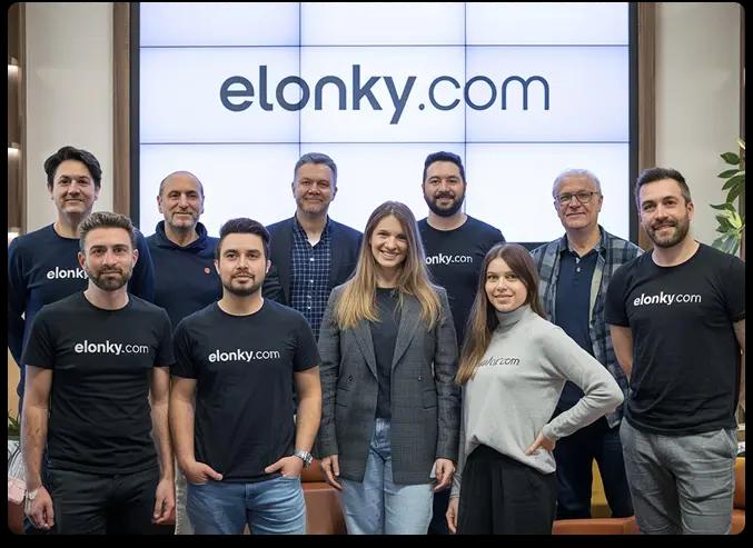 Office workers explaining the vision of the Elonky marketplace
